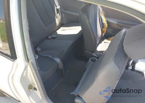 2000 Hyundai Accent L из США, поврежденный, VIN KMHCF35G6YU019915